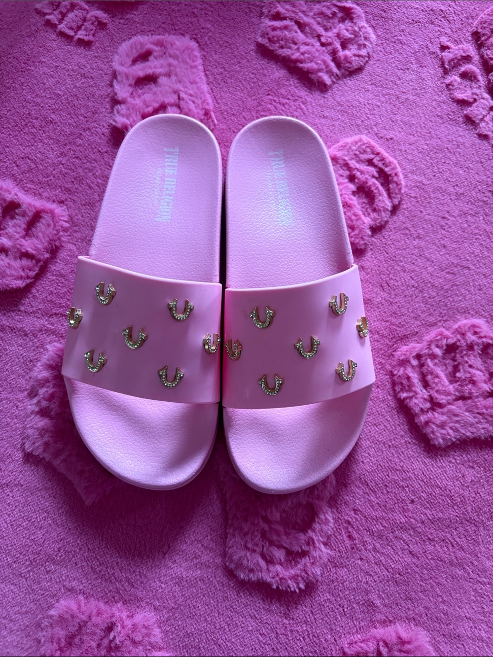 True Religion Pink Slide Sandals with Gold Horseshoe Accents